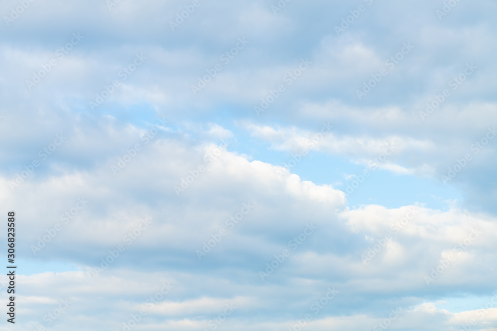 Idylic blue sky with fluffy cloud sunset Idylic blue sky with fluffy cloud sunset