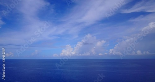Wallpaper Mural Peaceful heaven with frozen veil of clouds hanging over deep blue ocean at sunrise in Dominican Republic, copy space Torontodigital.ca
