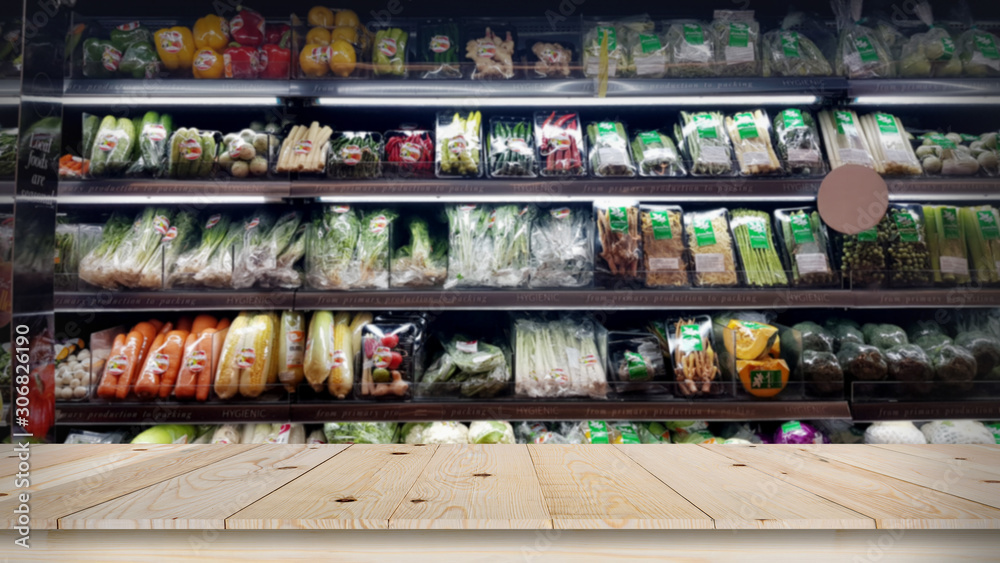 Fototapeta premium Empty wood table top with vegetable market blurred background