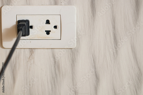 Bilde på lerret Focus white plug socket 2 channels on the wood wall
