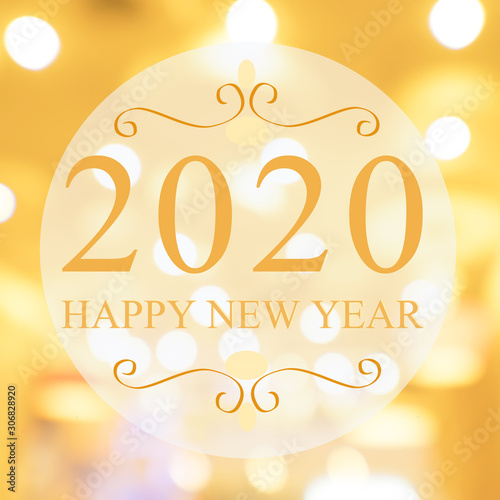 Happy New Year 2020 year on beautiful blur background shopping mall and bokeh. Gold tone.