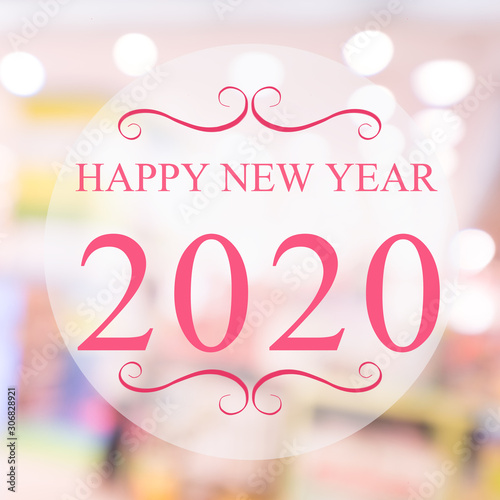 Happy New Year 2020 year on beautiful blur background shopping mall and bokeh. Pink tone.