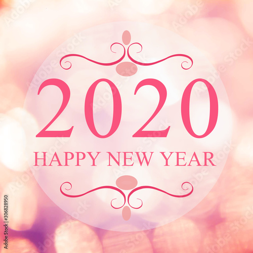 Happy New Year 2020 year on beautiful blur background shopping mall and bokeh. Pink tone.