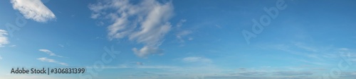 Panorama image of Beautiful white clouds with blue sky in summer seasonal.