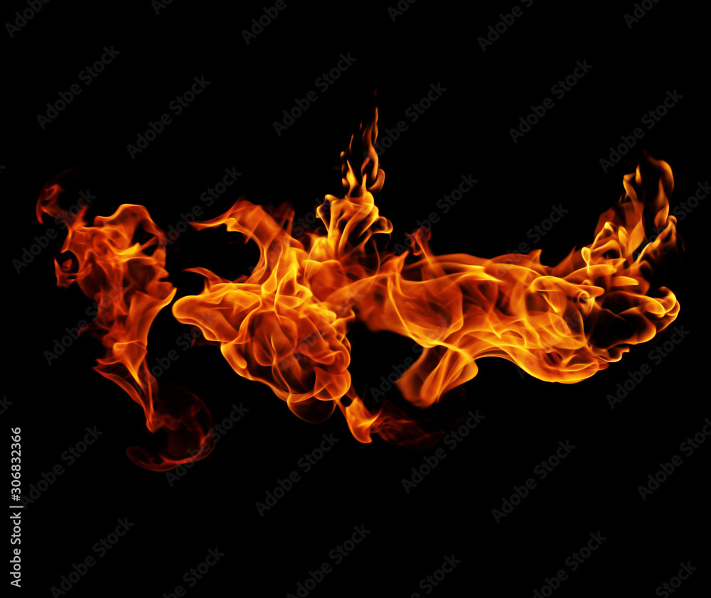 Fototapeta premium Fire burning flames on a black background