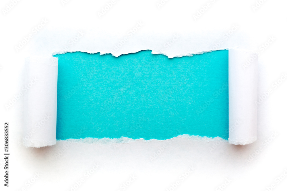 Obraz premium A hole in white paper with torn edges isolated on a white background with a light blue color paper background inside. Good paper texture