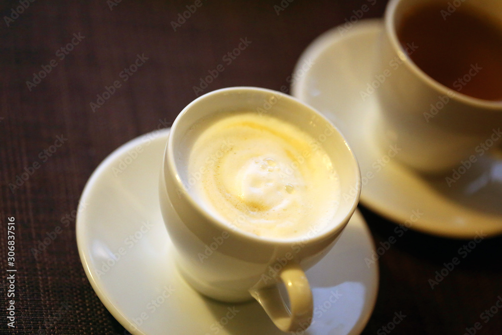 Photo macro delicious coffee with milk