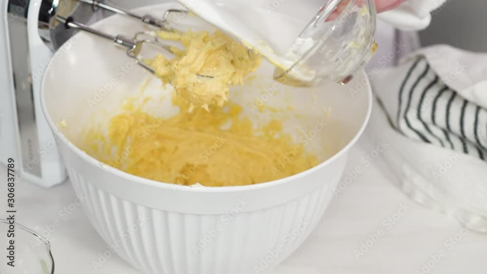 Step by step. Mixing batter to bake vanilla cupcakes with buttercream frosting. Step by step. Mixing batter to bake vanilla cupcakes with buttercream frosting.