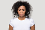 Unhappy dissatisfied African American woman feeling upset