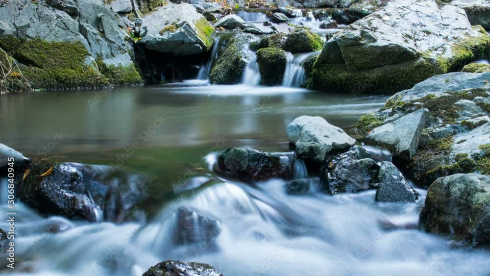 Mountains Clean River between stones fresh drinking water time lapse footage.