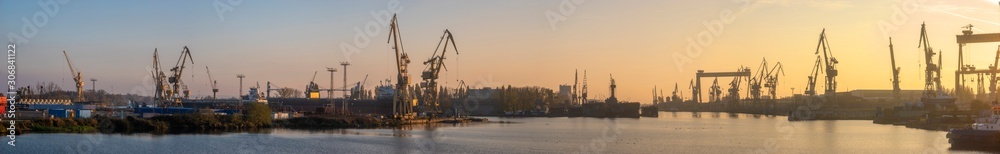 Industrial landscape. Cranes and gantries in the Szczecin shipyard.Panorama.