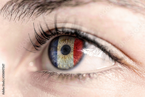 Flag of france reflects in woman green eye - close-up view - election, sport, hope, young, generation 