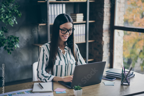 Quadro em tela Photo of cheerful toothy beaming intelligent clever business girl looking into s
