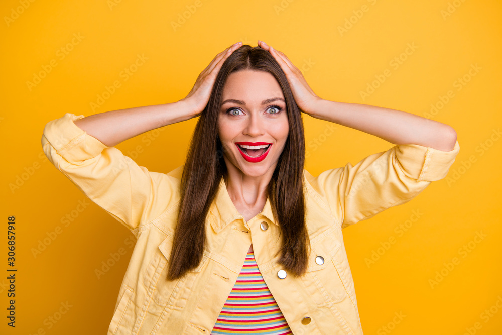 Photo of cheerful cute nice pretty girl holding head unable to believe in sales started expressing emotions on face fun isolated vivid color background Photo of cheerful cute nice pretty girl holding head unable to believe in sales started expressing emotions on face fun isolated vivid color background