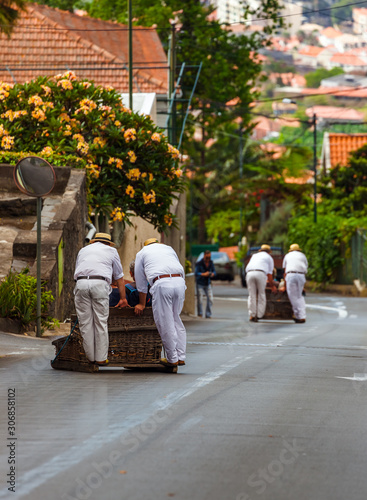 Toboggan riders on sledge in Monte - Funchal Madeira Portugal