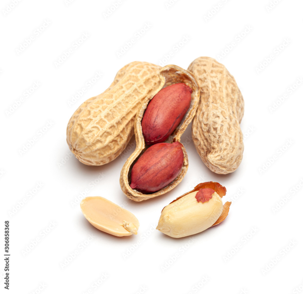 Dried peanuts in peel closeup isolated on white background Dried peanuts in peel closeup isolated on white background