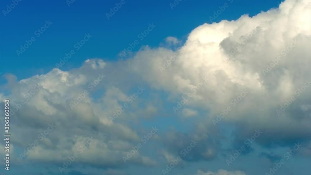 Time Lapse, White Fluffy Clouds On Dark Blue Sky Time Lapse, White Fluffy Clouds On Dark Blue Sky