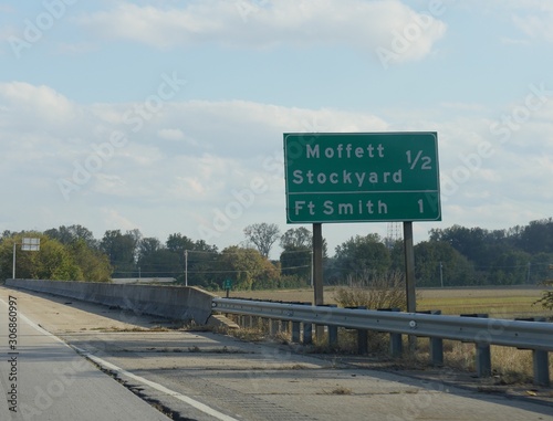 Roadside sign and directoins to Moffett Stockyard at Fort Smith, Arkansas. photo