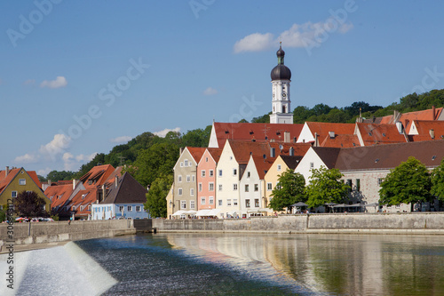 Waterfront promenade and Lech dam in the town of Landsberg am Lech on a summer evening