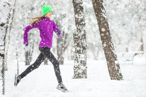 Winter running, exercise woman. Healthy lifestyle