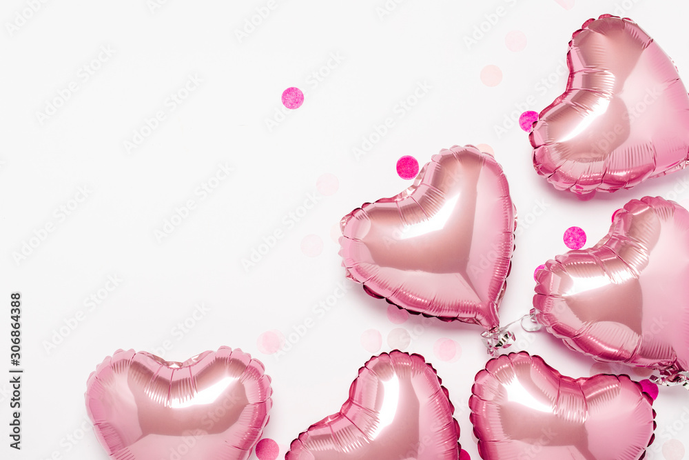 Pink air balloons heart shape on a white background. Concept wedding, valentines day, photo zone, lovers. Flat lay, top view Pink air balloons heart shape on a white background. Concept wedding, valentines day, photo zone, lovers. Flat lay, top view