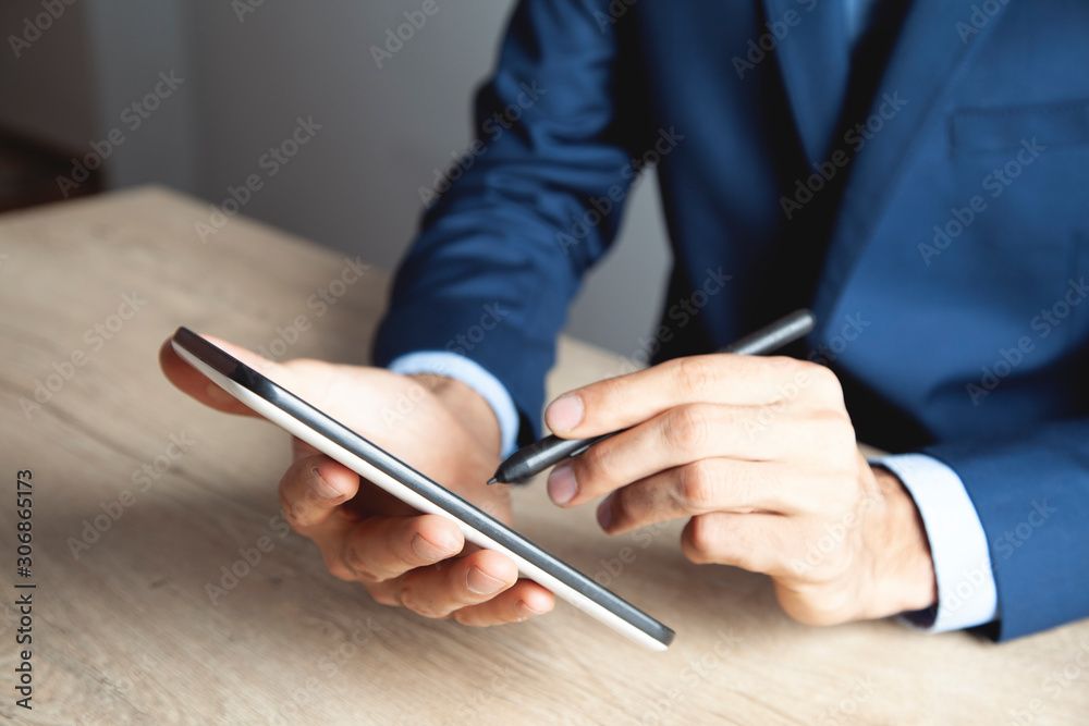 businessman works with a tablet businessman works with a tablet