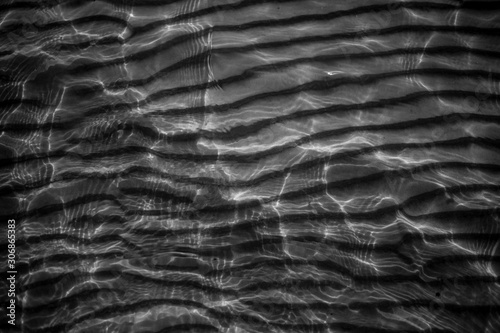 Small vawes of baltic sea. Patterns of water and light.  photo
