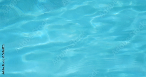 Blue water wave in swimming pool © leungchopan