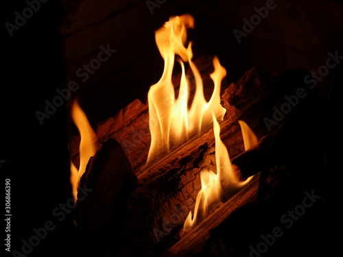 Cropped shot of flames leaping from a fireplace