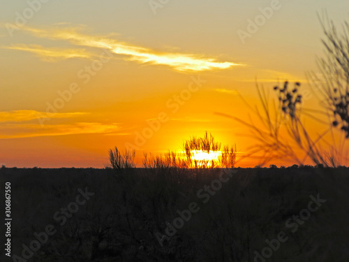 A stunning sunrise view in Uluru-Kata Tjuta National Park, which is a world famous tour attraction.