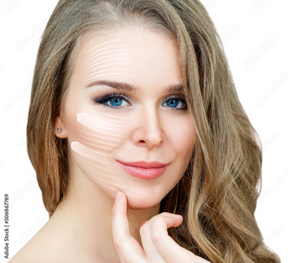 Graphic lines shows facial lifting effect on skin of beautiful woman. Graphic lines shows facial lifting effect on skin of beautiful woman.