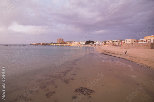 Twilight in Cadiz city Andalusia Spain Caleta beach and San Sebastian castle