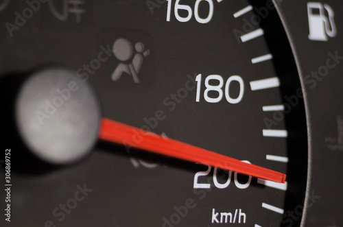 Close-up of the car speed meter. Car speedometer close up, speed 200