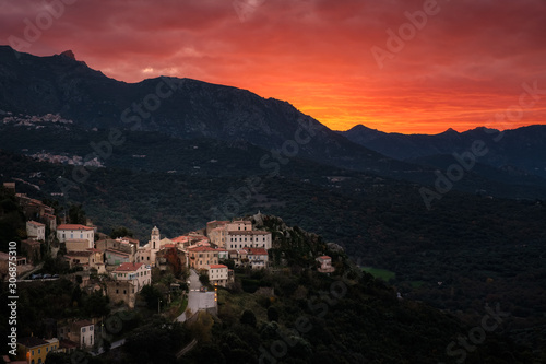 Orange sunset over village of Belgodere in Corsica © Jon Ingall