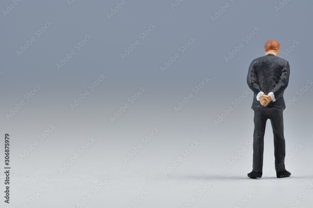 mini business men standing