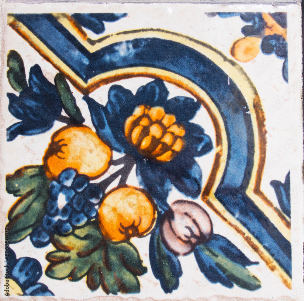 Detail of the traditional tiles from facade of old house. Decorative tiles.