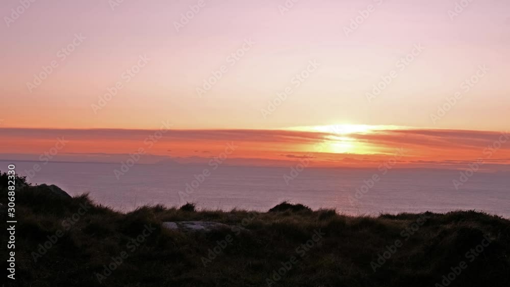Sheep enjoying the sunset at the Slieve League cliffs in County Donegal, Ireland Sheep enjoying the sunset at the Slieve League cliffs in County Donegal, Ireland