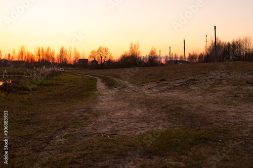 road in the village at sunset