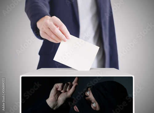 Fototapeta Naklejka Na Ścianę i Meble -  Man putting a ballot into a voting box. Thief Inside a Box Stealing Voting Ballot. Ellection concept.