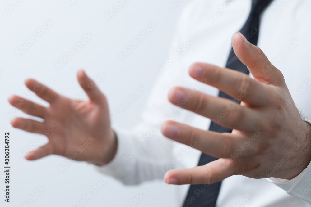 Fototapeta premium Businessman without head holding something without theme.