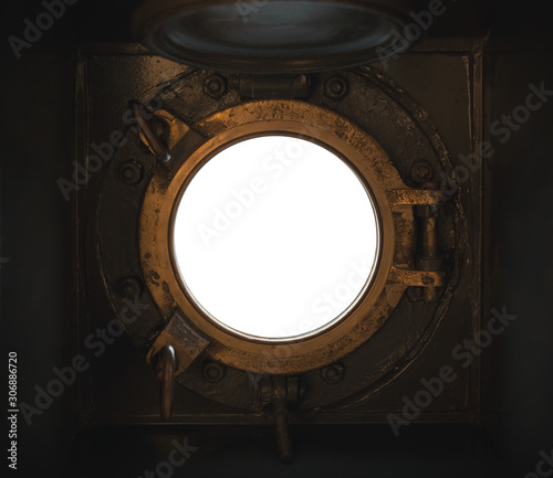 Open round porthole in brass frame