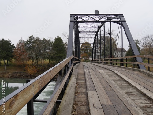 Wide shot of the War Eagle Bridge, an old bridge listed in the National Register of Historical Places in Arkansas.