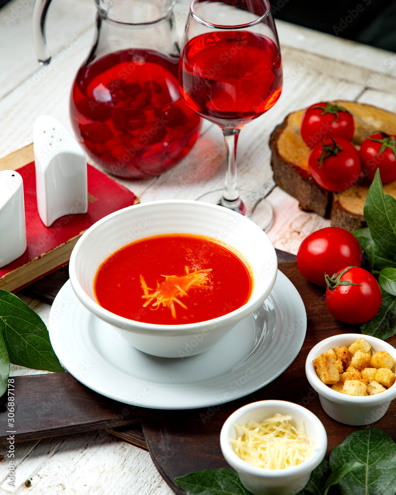 tomato soup with crackers and grated cheese tomato soup with crackers and grated cheese