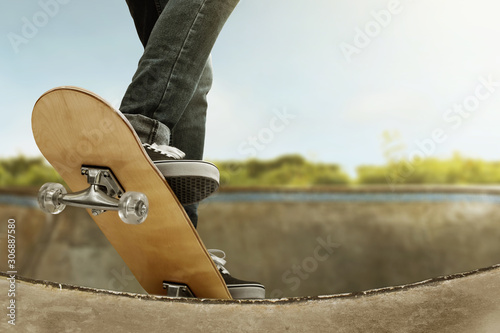 Skateboarder skateboarding at skate park