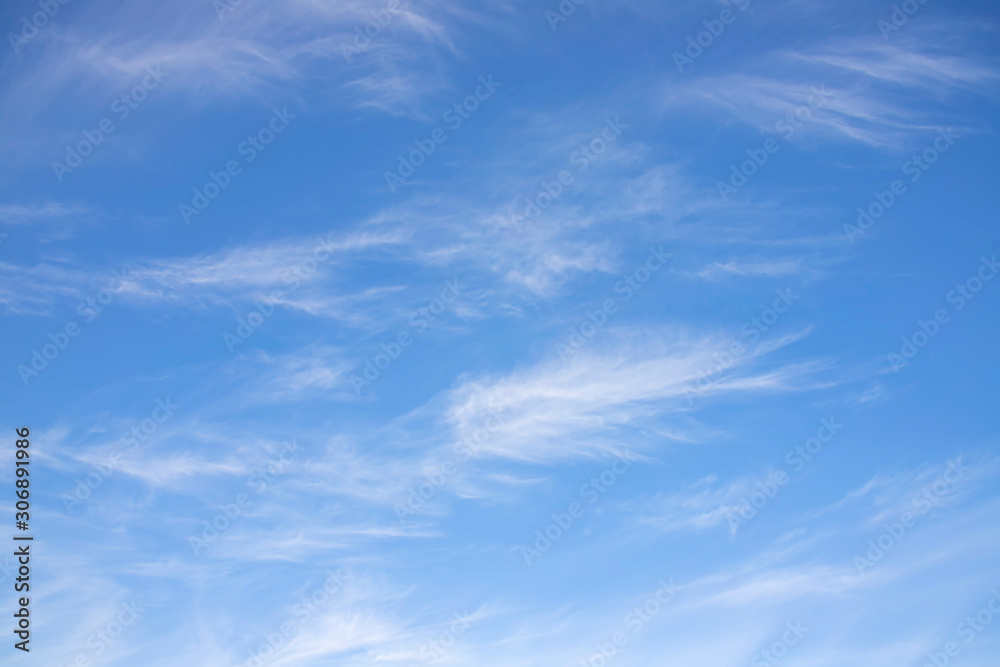 Abstract background of blue sky with cirrus clouds