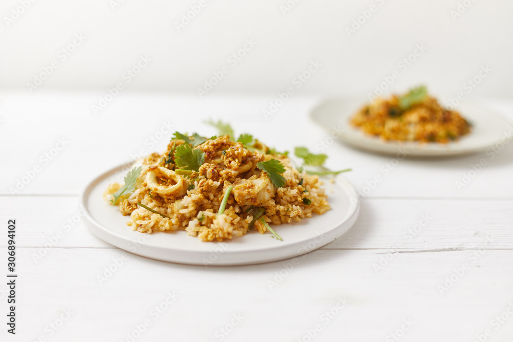 Stir fried squid with curry powder, Thai food . Stir fried squid with curry powder, Thai food .