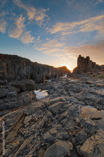 Morning sunlight at the rock terrain. Bombo Quarry, NSW, Australia.
