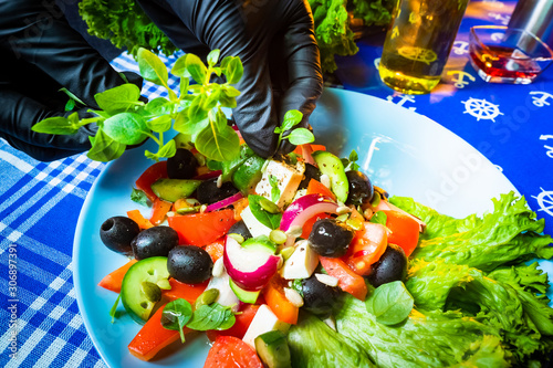 Cooking Greek Salad. Cook i...