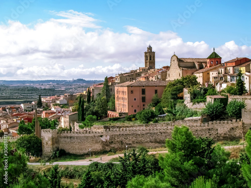 View of the Old City of Cervera in Catalonia (Spain). Beautiful Catalan landscape of a medieval town with an ancient wall on a background of a valley © ioanna_alexa