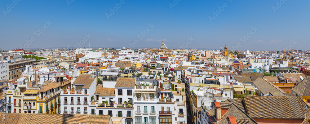 Panoramic view of Seville from the height of the Giralda tower of Cathedral on a sunny day.